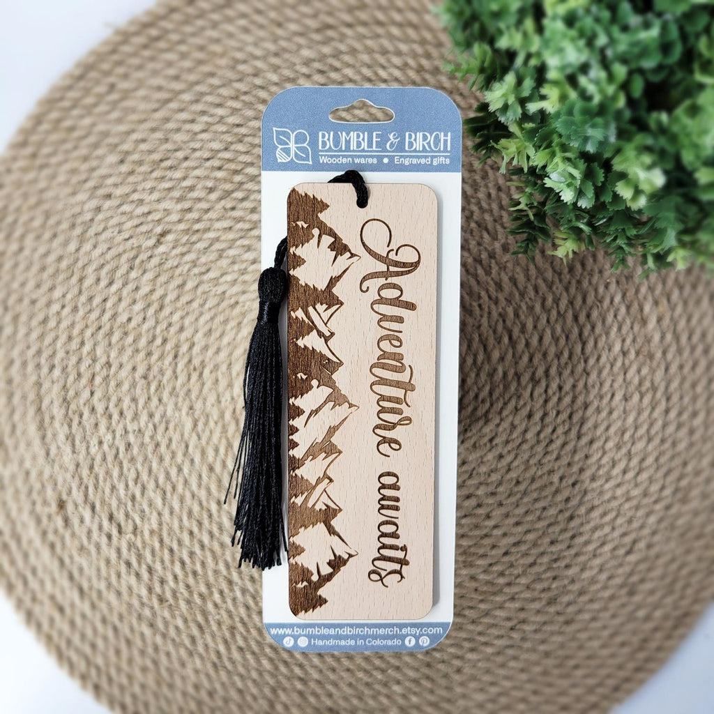 Adventure awaits wooden bookmark with black tassel and packaging