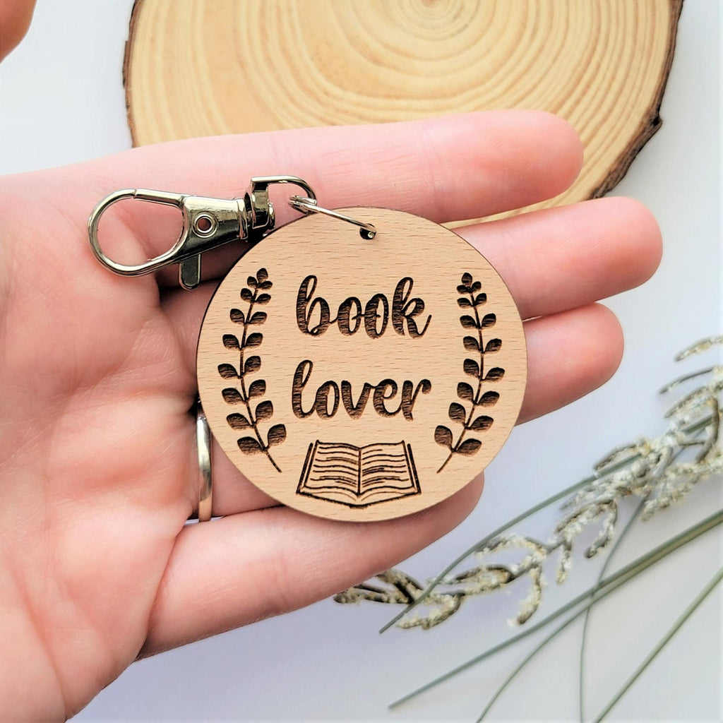 Book lover round wooden engraved keychain