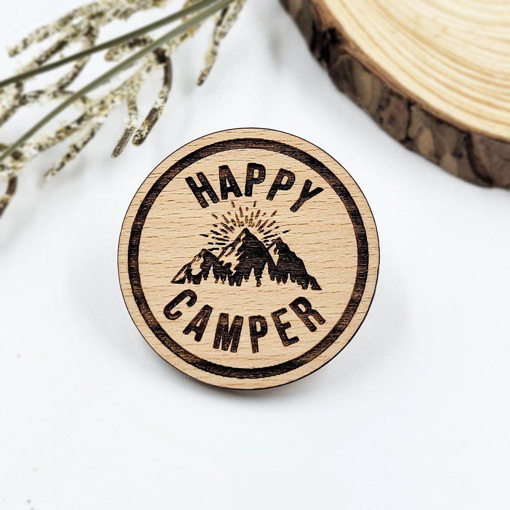 Happy camper round pin with engraved mountains