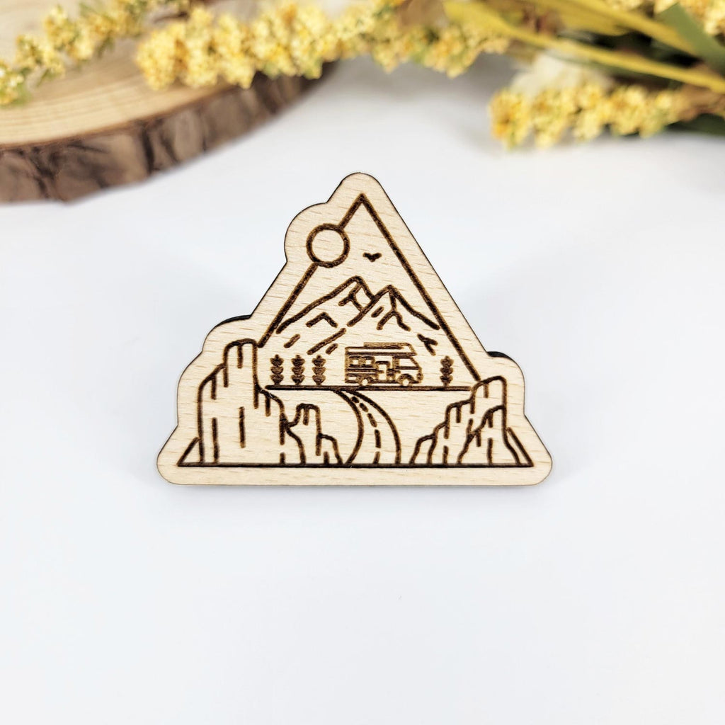 Line art RV and mountains wood pin