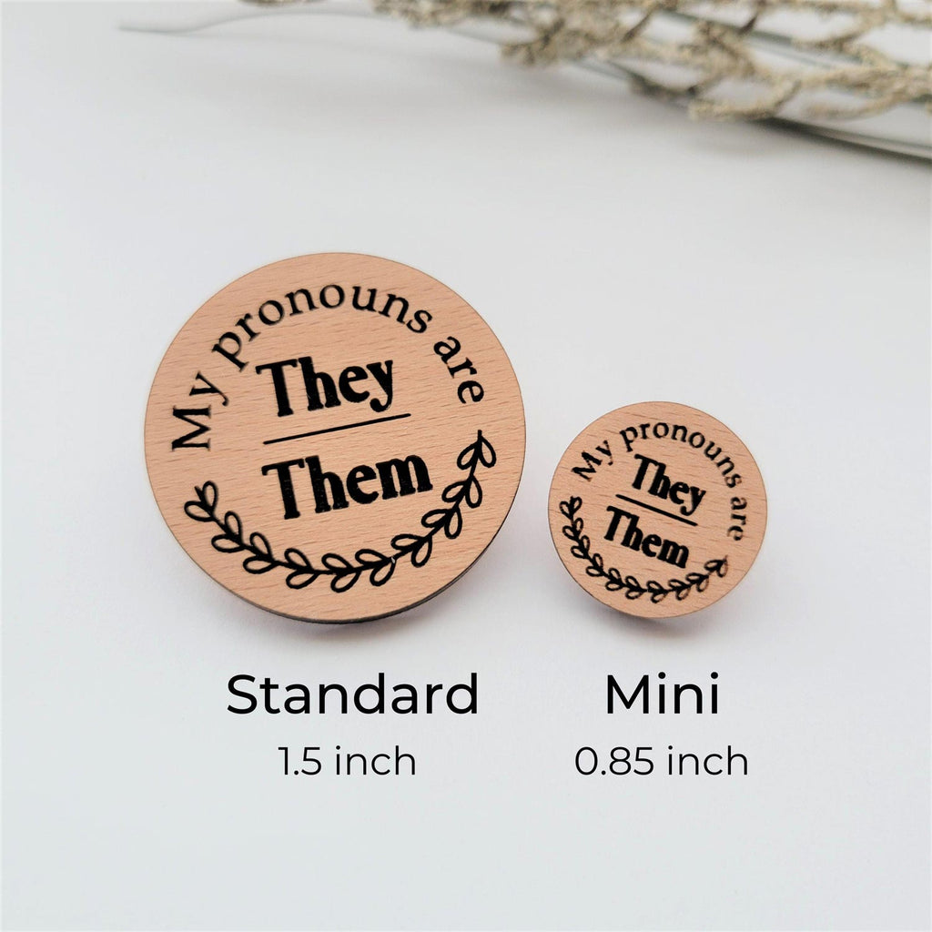 My pronouns are They/Them wood round pin, standard size 1.5 inch, mini size 0.85 inch