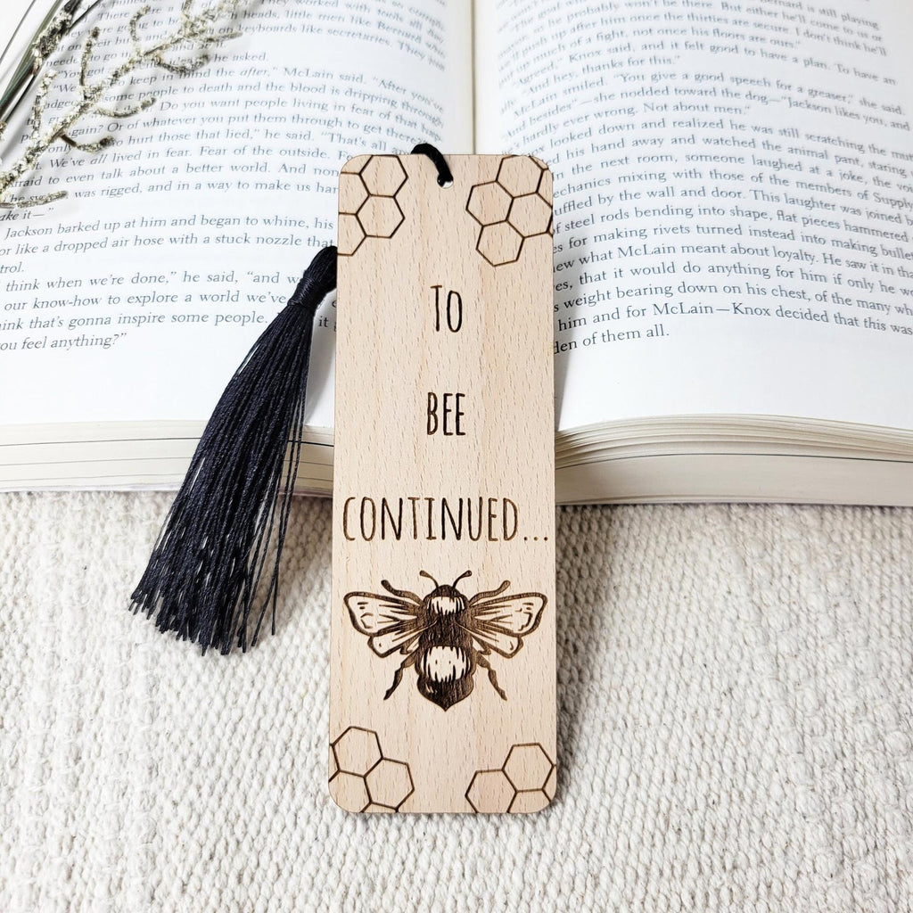 To bee continued, bee and honeycomb engraved wooden bookmark with black tassel