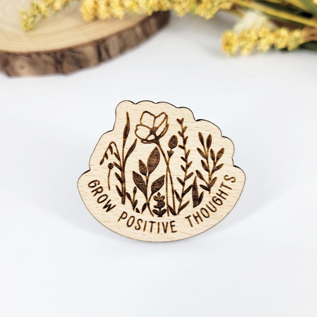 'Grow positive thoughts' floral engraved pin