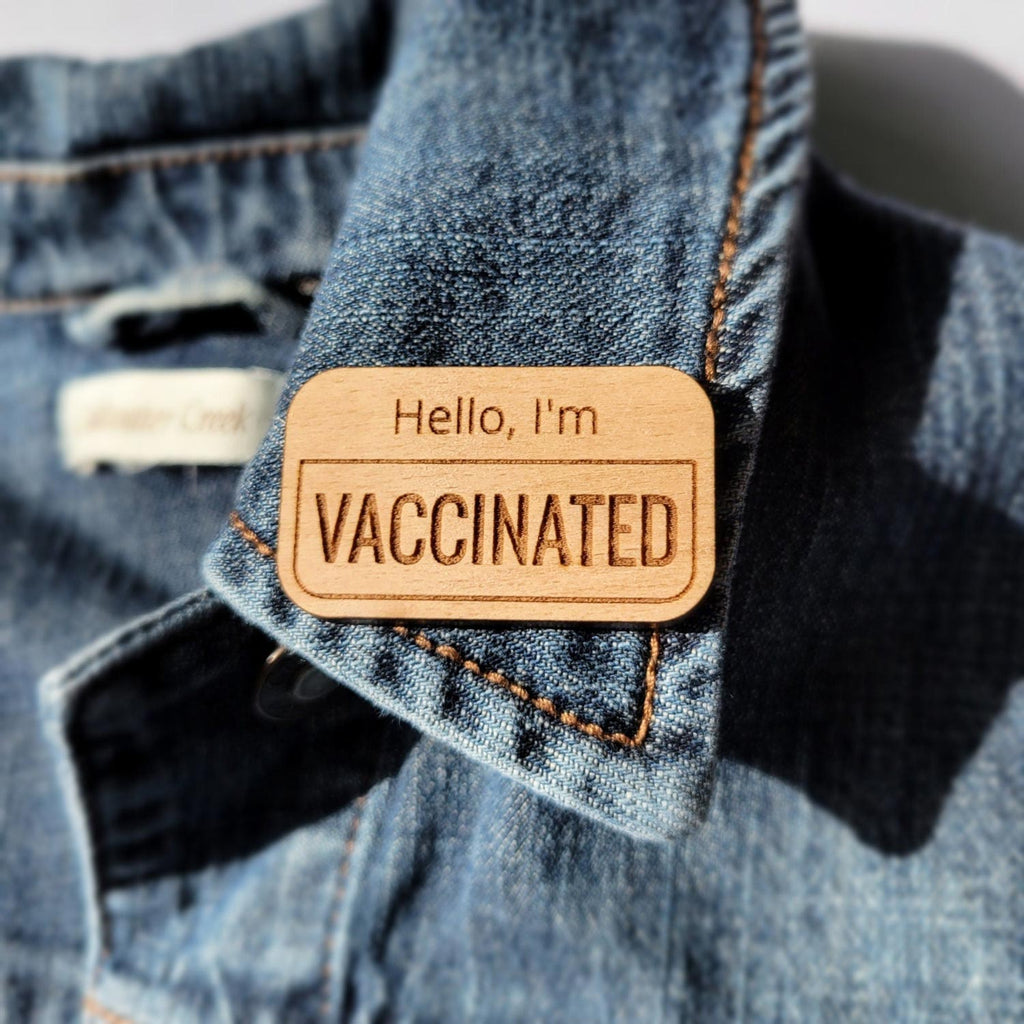 Hello, I'm vaccinated wooden pin on a jacket