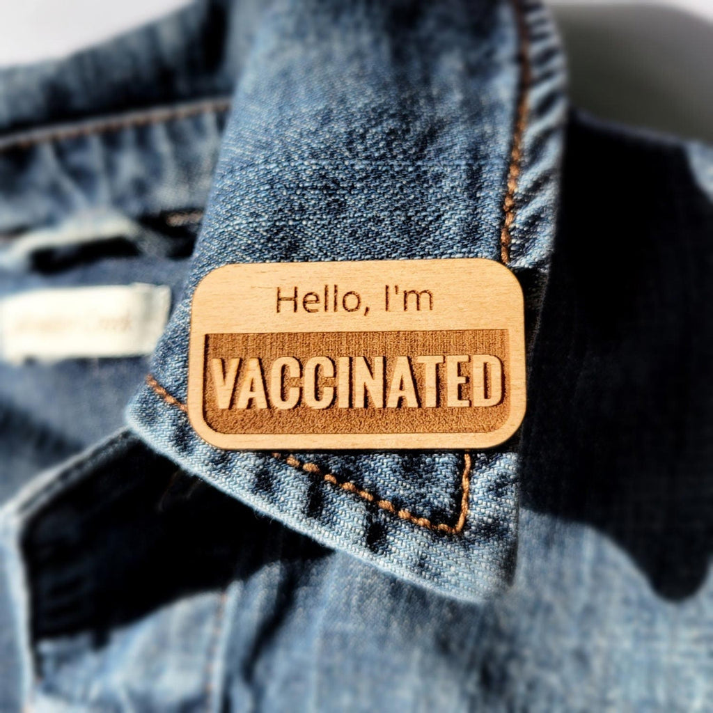 Hello, I'm vaccinated wooden pin on a jacket