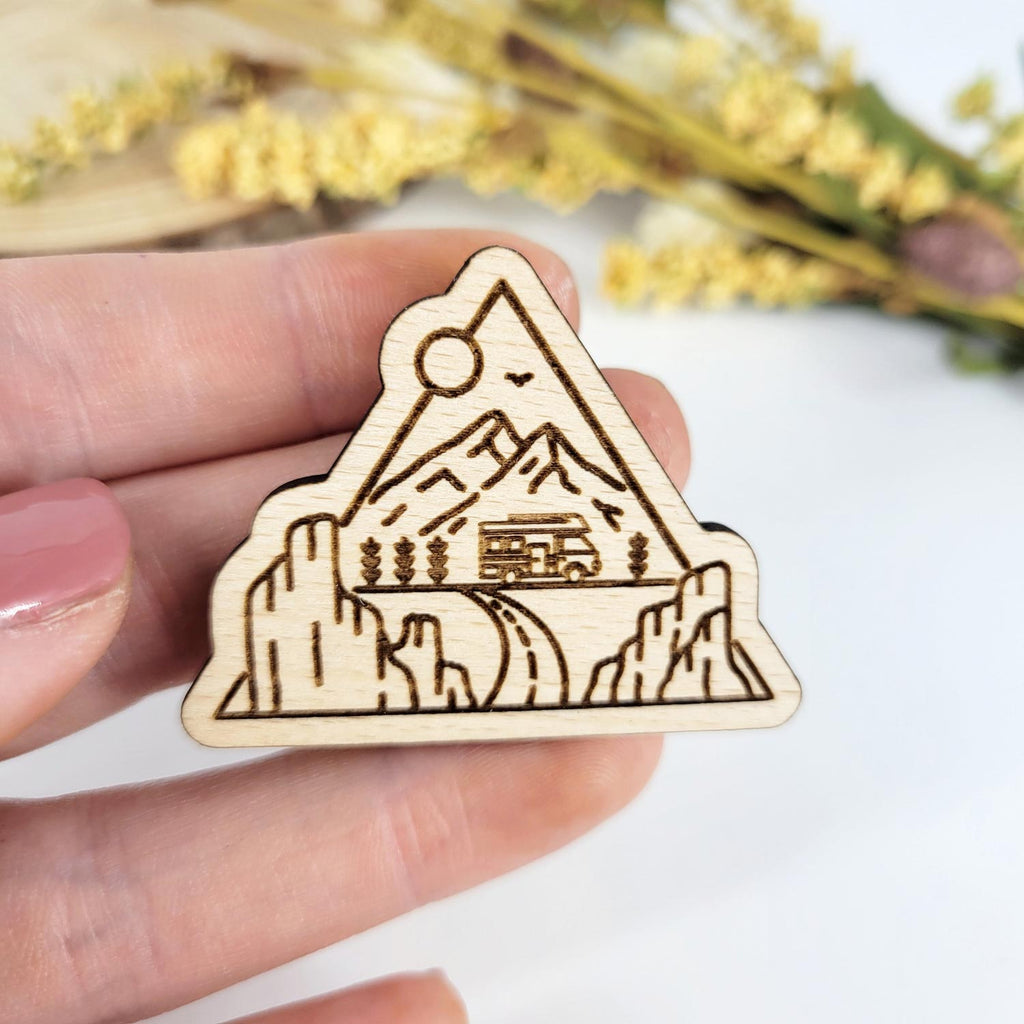 Line art RV and mountains wood pin