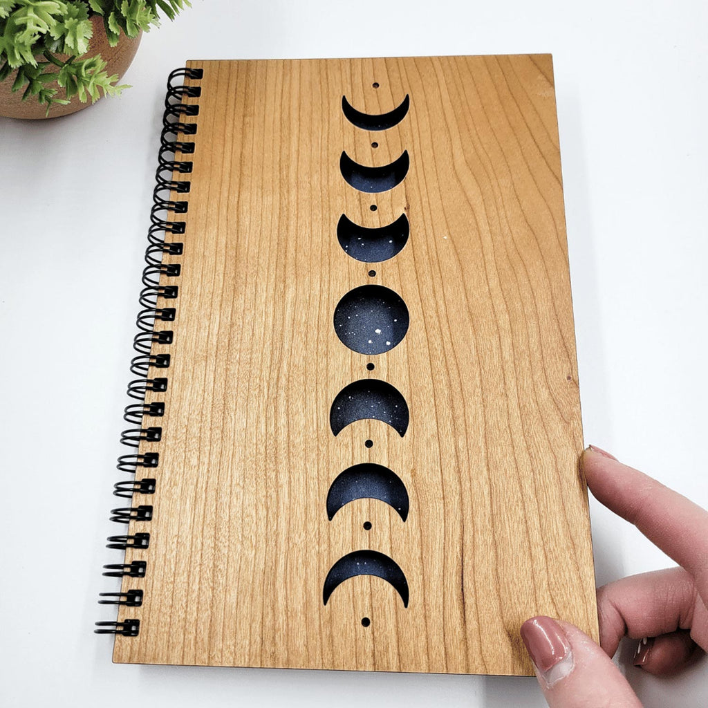 Moon phases with galaxy background wood journal
