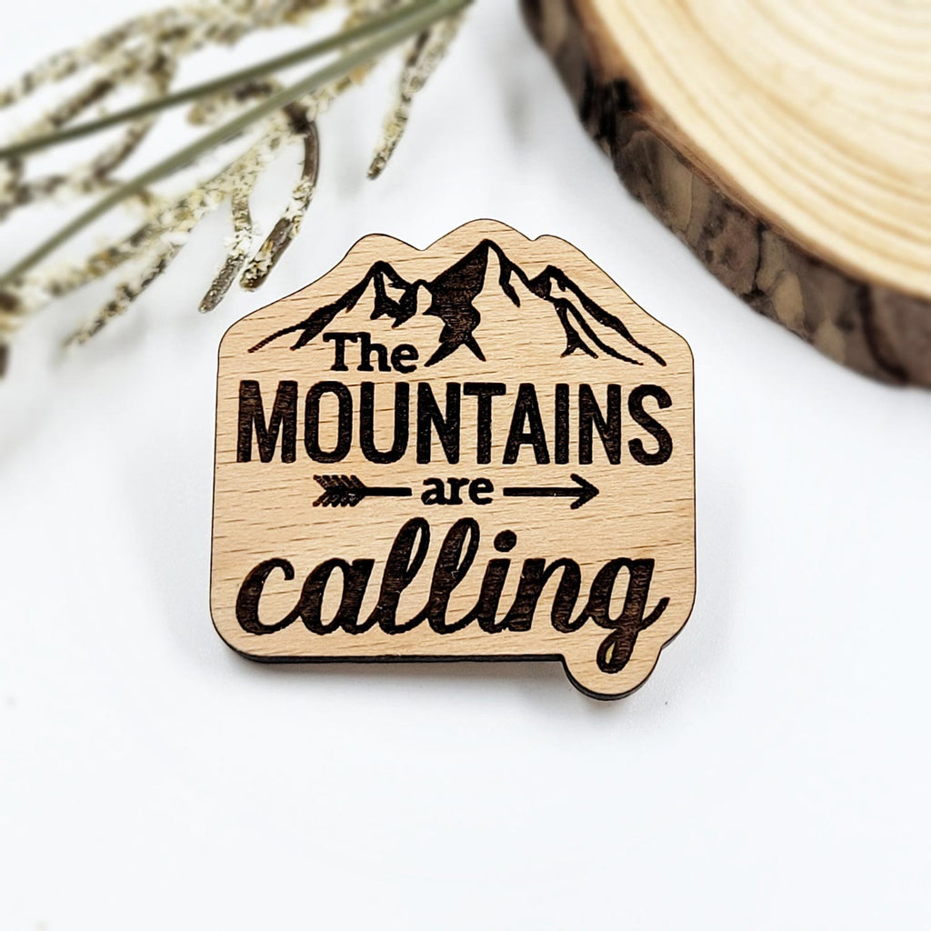 The mountains are calling engraved wood pin