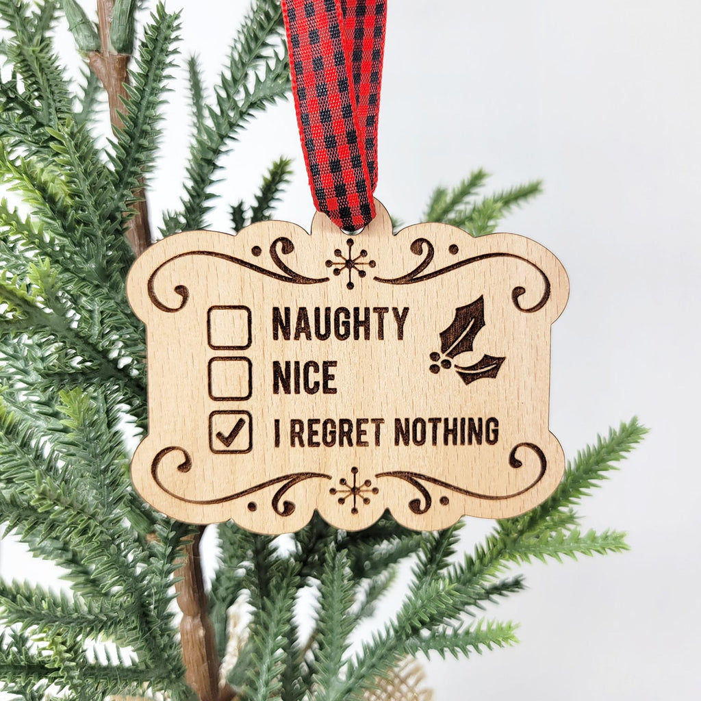 Naughty, nice, I regret nothing tick box wood ornament with checkered red ribbon