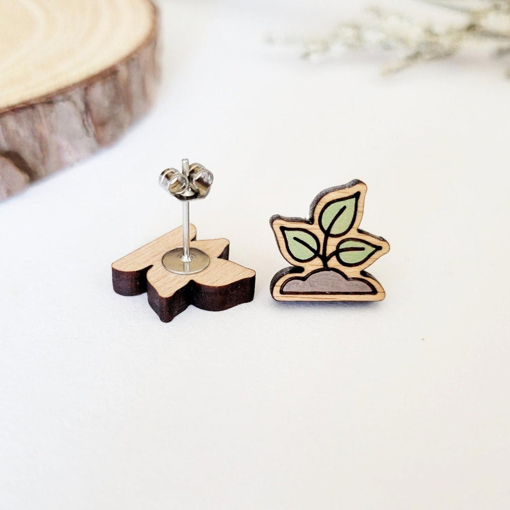 Plan seedling shaped stud earrings, front and back