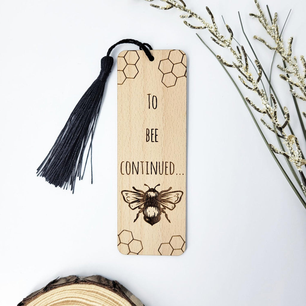 To bee continued, bee and honeycomb engraved wooden bookmark with black tassel